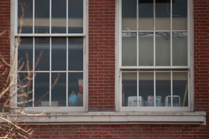 Text books and a globe are seen on a window at P.S. 134 elementary school during the COVID-19 pandemic in the Brooklyn borough of New York City