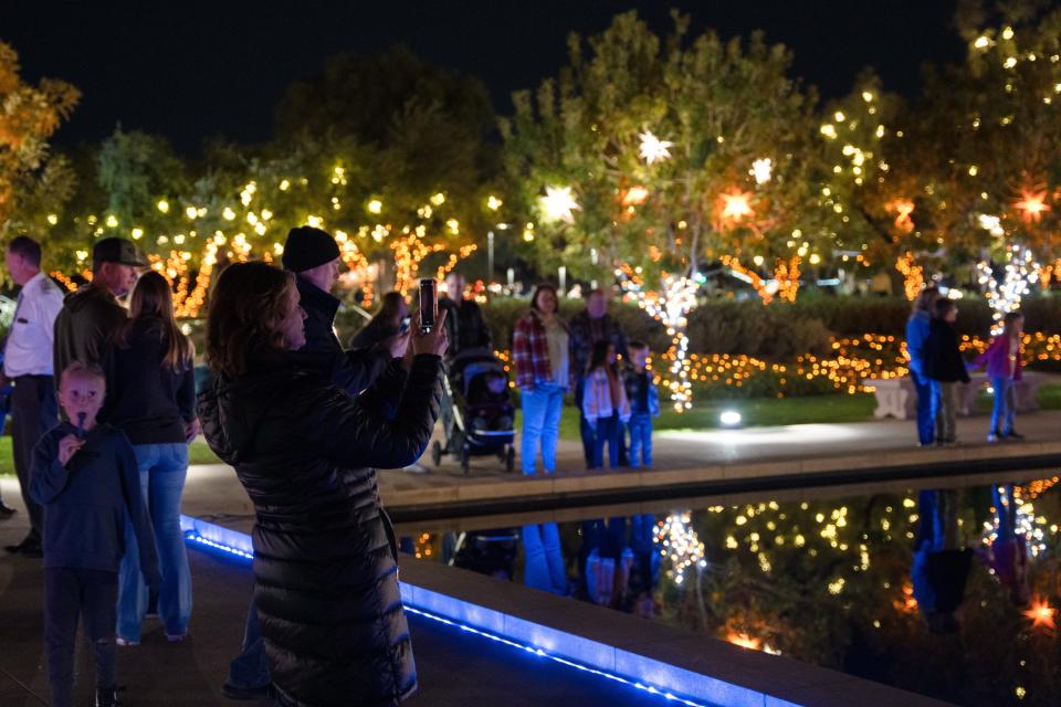 Visitors look at the Christmas lights at the Mesa Arizona Temple of the Church of Jesus Christ of Latter-day Saints on Dec. 2, 2022.