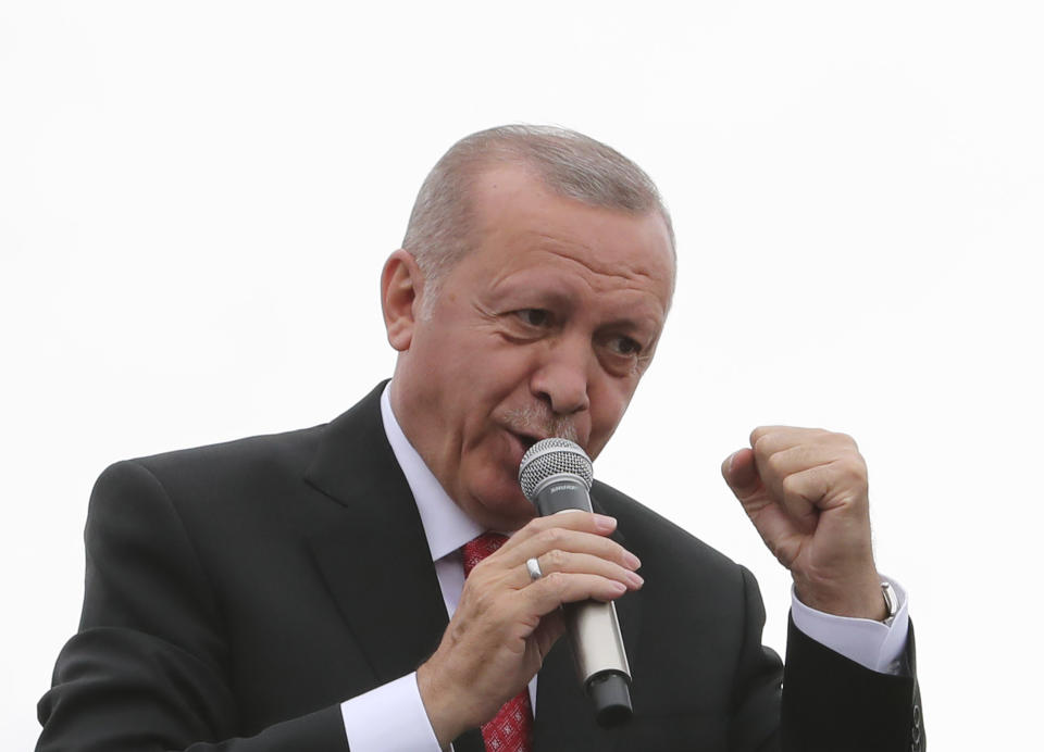 Turkey's President Recep Tayyip Erdogan, gestures as he talks during a campaign rally in Istanbul for the June 23 re-run of Istanbul elections, Wednesday, June 19, 2019. Erdogan has claimed that former Egyptian President Mohammed Morsi did not die of natural causes but that he was killed. At the campaign speech Erdogan offered as evidence the fact that the deposed president allegedly "flailed" in court for 20 minutes and that nobody assisted him. (Presidential Press Service via AP, Pool)
