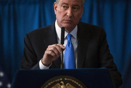 New York Mayor Bill de Blasio speaks at a news conference in the Brownsville neighborhood in the borough of Brooklyn, New York January 30, 2014. REUTERS/Eric Thayer