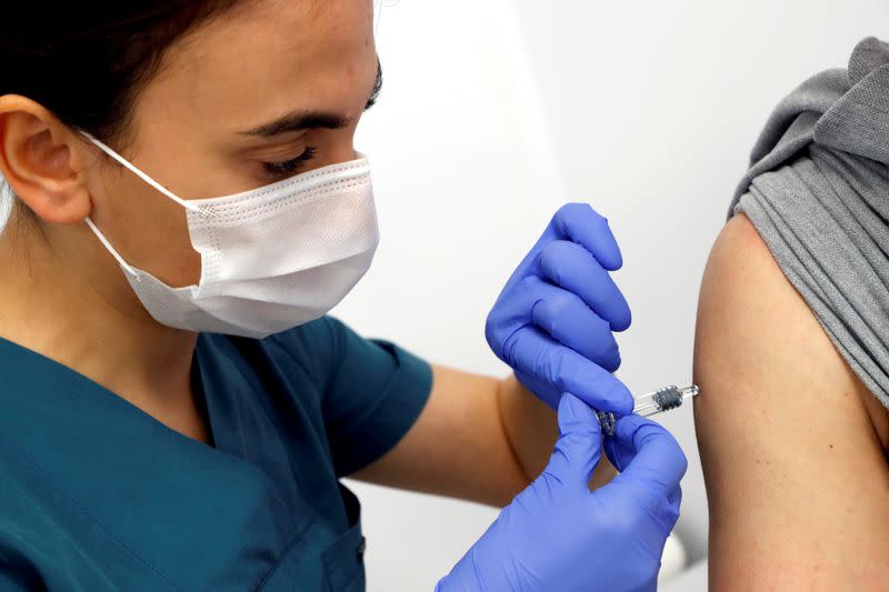 FILE PHOTO: A volunteer is injected with an experimental Chinese coronavirus disease (COVID-19) vaccine in Kocaeli