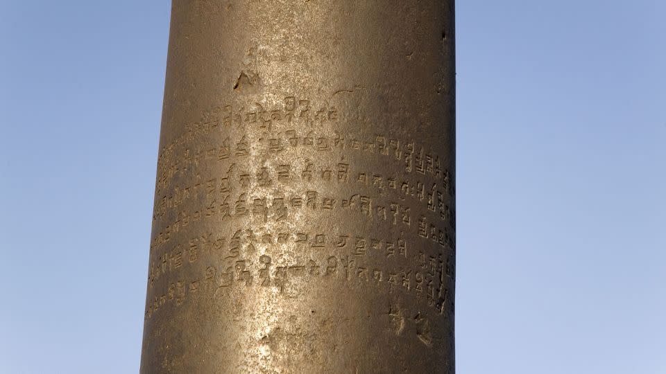 A closeup of the inscription on the Iron Pillar. - Stuart Forster/Shutterstock