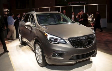 General Motors Co. displays its U.S. version of the Buick Envision crossover during a media event before the start of the North American International Auto Show in Detroit