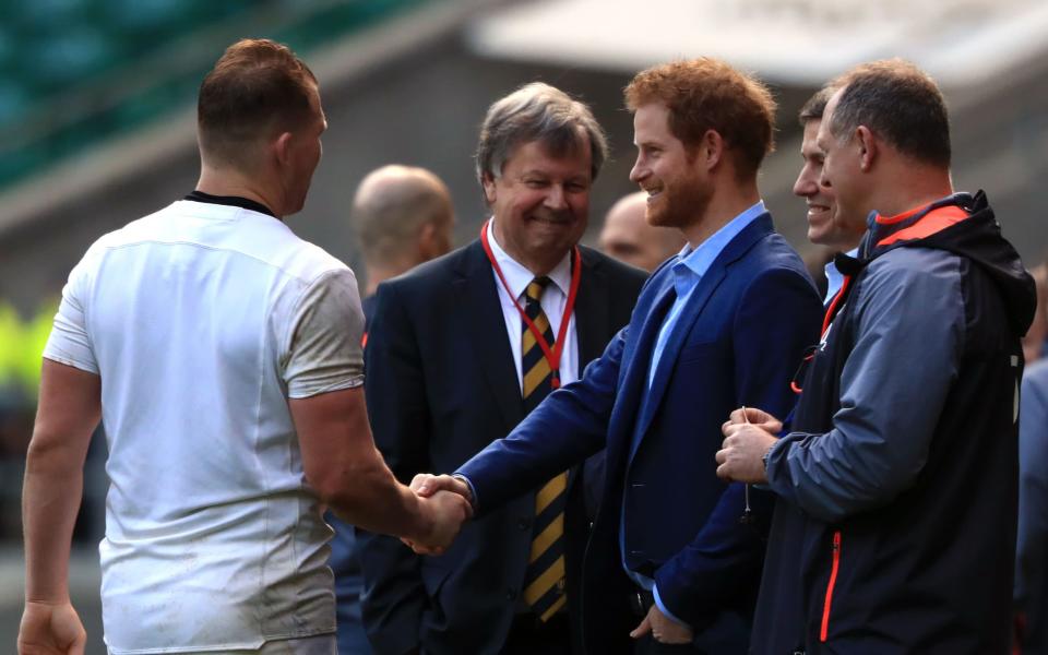 Prince Harry joins 12,000 spectators at Twickenham to watch England's open training session