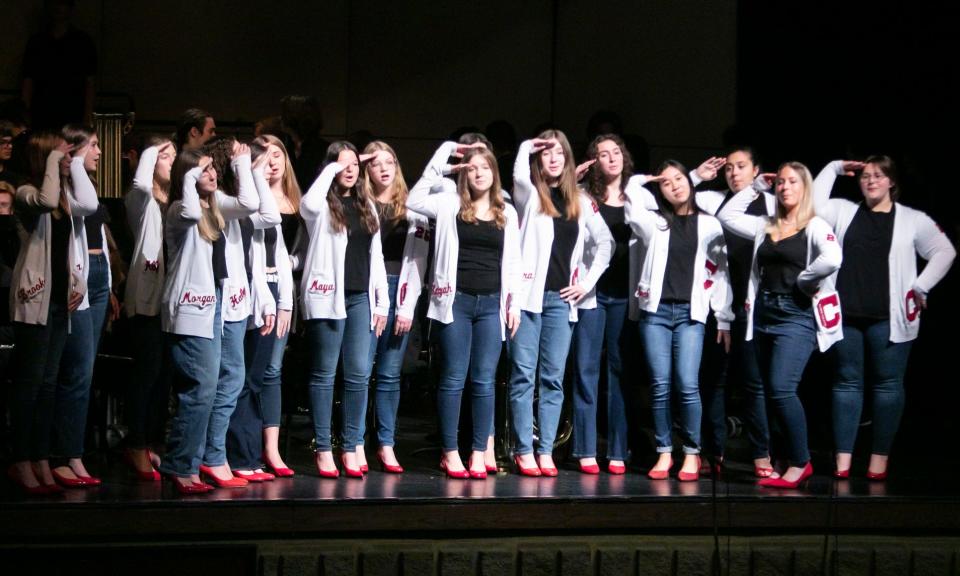 Members of the Howell High School choral group Classicality sing "Boogie Woogie Bugle Boy" as part of a Veterans Day assembly in the school's auditorium Friday, Nov. 11, 2022.