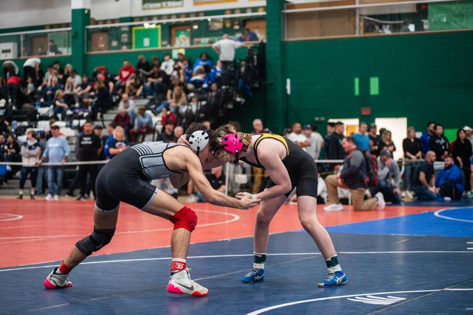 Briarcliff-Byram Hills' Peter Hinze, left, wrestles Honeoye Falls-Lima's Waylan Winseman during Eastern States Classic wrestling at SUNY Sullivan in Loch Sheldrake, NY on Friday, January 12, 2024.