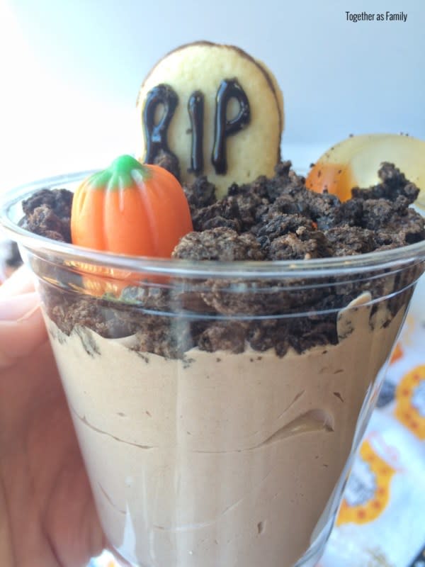 <p>While a spookier scene is set on this twist on classic dirt pudding cups, they remain tasty as ever.</p><p><strong>Get the recipe:</strong> <a href="https://togetherasfamily.com/spooky-graveyard-dirt-pudding-cups/" rel="nofollow noopener" target="_blank" data-ylk="slk:Spooky Graveyard Dirt Pudding Cups;elm:context_link;itc:0;sec:content-canvas" class="link ">Spooky Graveyard Dirt Pudding Cups</a></p>