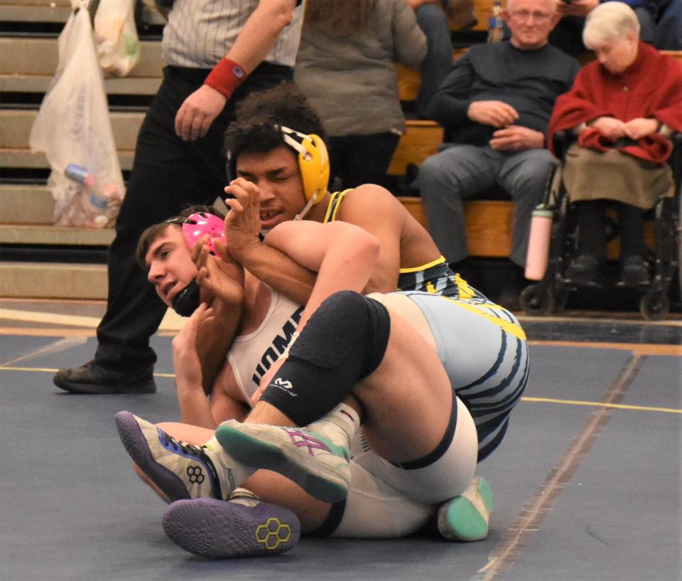 Ethan Randall (right), Central Valley Academy's 189-pounder, battles Maddox Johnson from Homer at Section III's Class B Tournament Saturday in Ilion.
