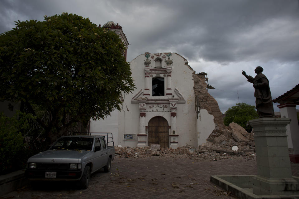 <p>San Vicente church stands heavily damaged after Thursday’s magnitude 8.1 earthquake, in Juchitan, Oaxaca state, Mexico, Sunday, Sept. 10, 2017. In the quake-shocked city of Juchitan, a third of the homes are reported uninhabitable and repeated aftershocks have scared people away from many structures still standing. (AP Photo/Rebecca Blackwell) </p>