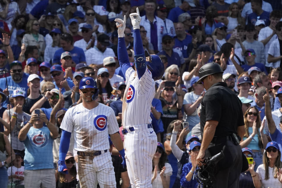 Chicago Cubs' Christopher Morel gestures at home plate after hitting a home run against the Arizona Diamondbacks during the third inning of a baseball game, Sunday, Sept. 10, 2023, in Chicago. (AP Photo/David Banks)