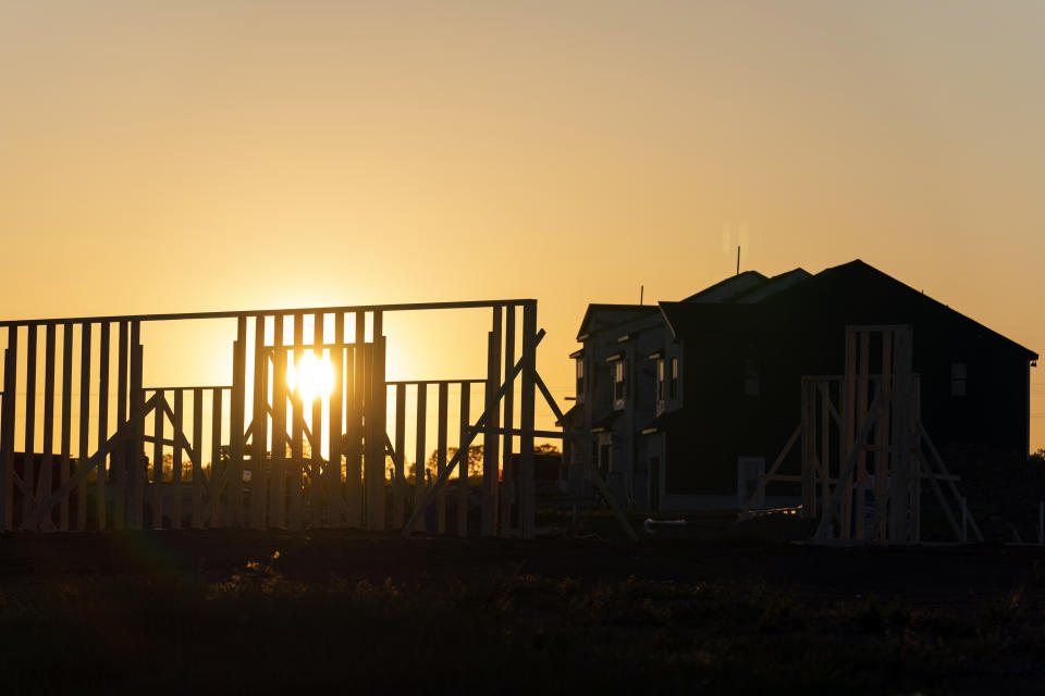 The sun sets on a new planned community called Nexus Tennessee as construction continues at the site along West Albert Gallatin Ave., Wednesday, May 3, 2023, in Gallatin, Tenn. (AP Photo/George Walker IV)