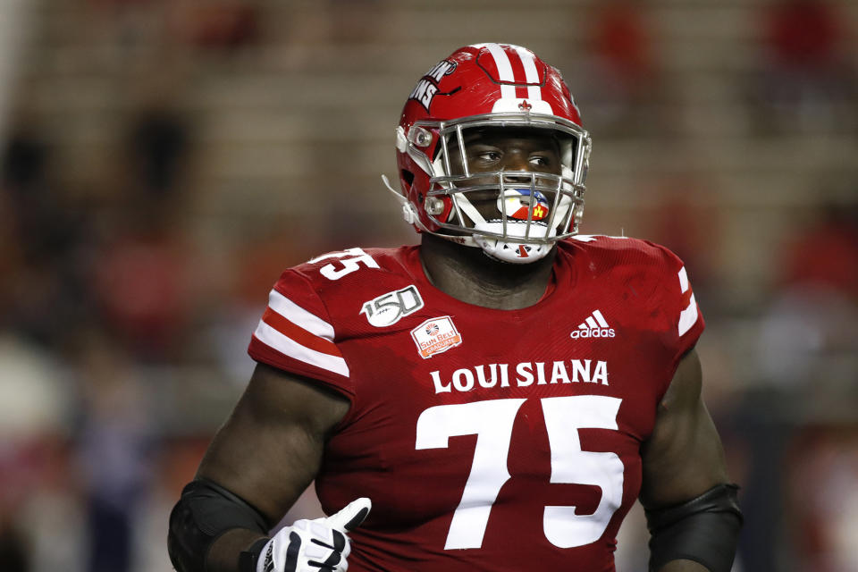 FILE - In this Sept. 7, 2019, file photo, Louisiana Lafayette offensive lineman Kevin Dotson (75) plays during an NCAA college football game against Liberty, in Lafayette, La. Dotson was selected to The Associated Press All-America team, Monday, Dec. 16, 2019. (AP Photo/Tyler Kaufman, File)