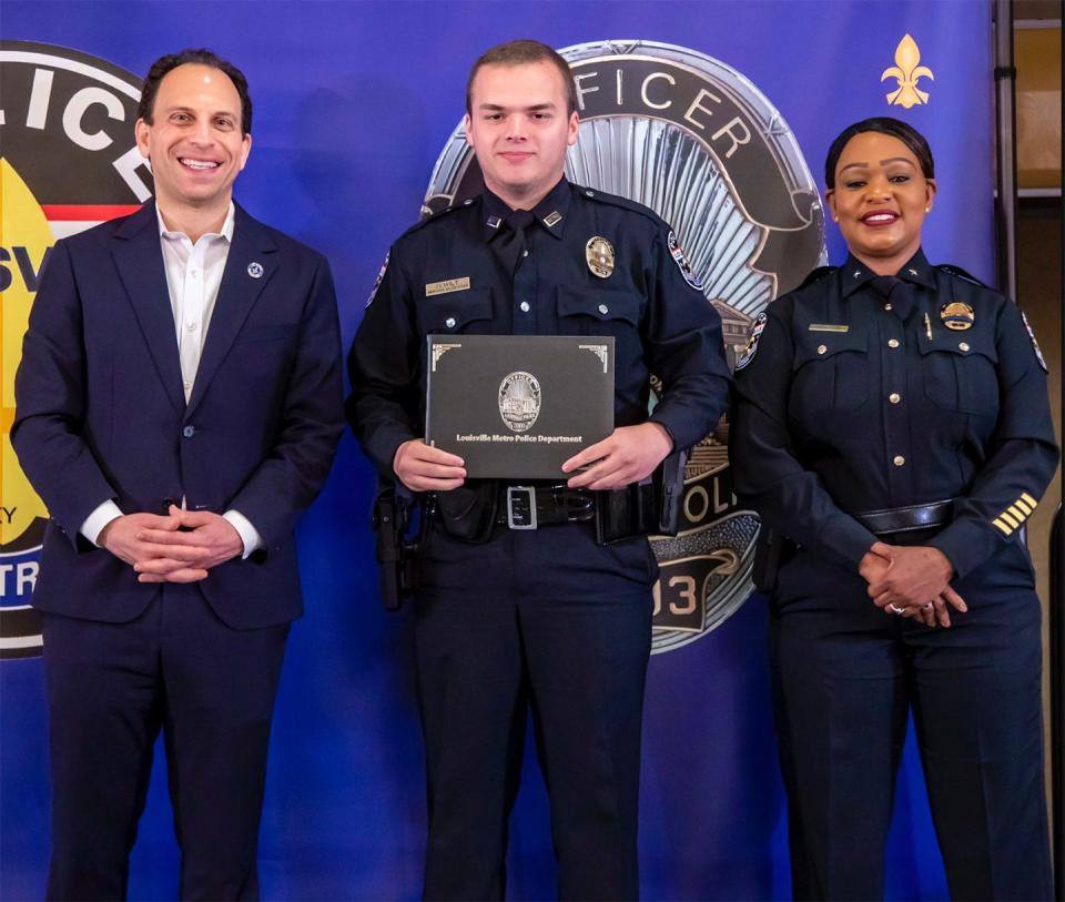 Officer Nickolas Wilt, was sworn in on March 31, 2023 .  He is is standing in between Mayor Craig Greenberg and Jacquelyn Gwinn-Villaroel