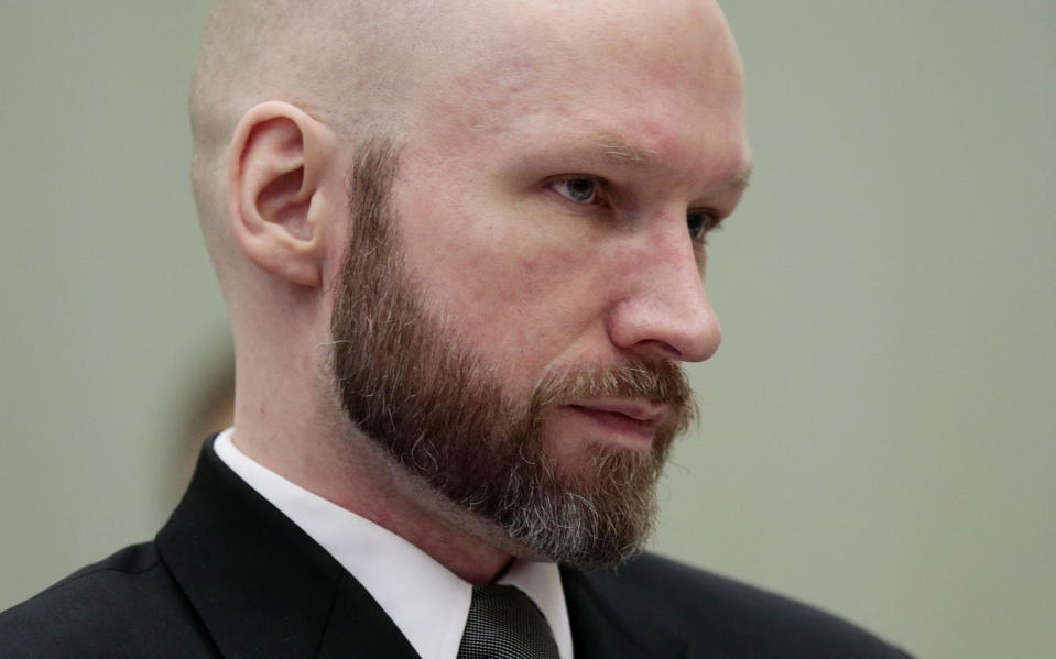 Anders Behring Breivik looks on during the last day of his appeal case in Borgarting Court of Appeal at Telemark prison in Skien, Norway, Wednesday, Jan. 18, 2017. Norway has defended the prison conditions under which mass murderer Anders Behring Breivik is being held. The state attorney presented its closing statement in an appeals trial against a lower court ruling that found that Breivik's isolation in prison violated his human rights. (Lise Aaserud/NTB Scanpix via AP)