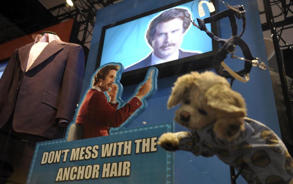 Props and costumes from the "Anchorman" movie are seen at an exhibit at the Newseum in Washington, Friday, Nov. 15, 2013. The museum about news and the First Amendment has opened "Anchorman: The Exhibit," featuring costumes and props from Will Ferrell's 2004 movie "Anchorman: The Legend of Ron Burgundy." The story of a fictional news team's sexist reaction to the arrival of an ambitious female reporter was a parody of real tumult in the 1970s TV business. (AP Photo/Susan Walsh)