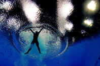 LONDON, ENGLAND - AUGUST 05: Minxia Wu of China competes in the Women's 3m Springboard final on Day 9 of the London 2012 Olympic Games at the Aquatics Centre on August 5, 2012 in London, England. (Photo by Clive Rose/Getty Images)