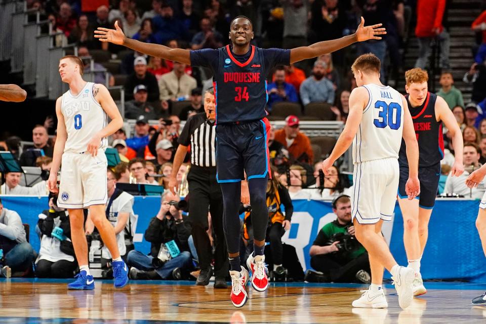 First round: Duquesne's Fousseyni Drame (34) reacts during the Dukes' upset of BYU at CHI Health Center Omaha.