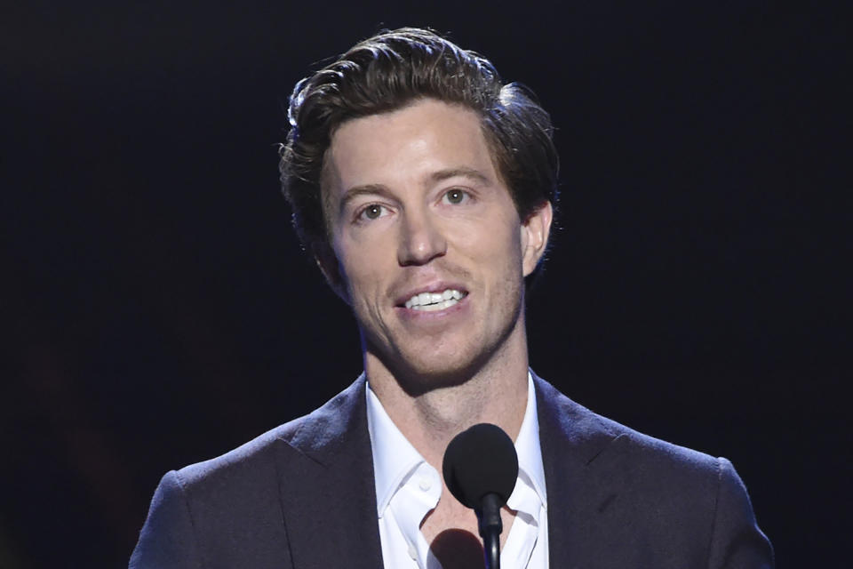 FILE - In this July 18, 2018, file photo, Shaun White accepts the award for best Olympic moment, at the ESPY Awards in Los Angeles. If the world sees Shaun White at an Olympics again, it will be in 2022, not later this year. The three-time snowboarding champion told The Associated Press that he is taking skateboarding off his plate and won’t try to qualify for that sport’s Olympic debut later this year in Tokyo. (Photo by Phil McCarten/Invision/AP, File)