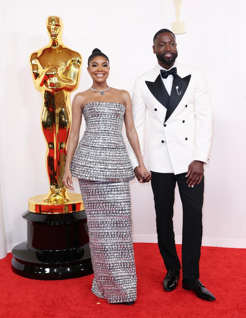 Image may contain: Dwyane Wade, Gabrielle Union, Fashion, Accessories, Jewelry, Necklace, Adult, Person, and Wedding