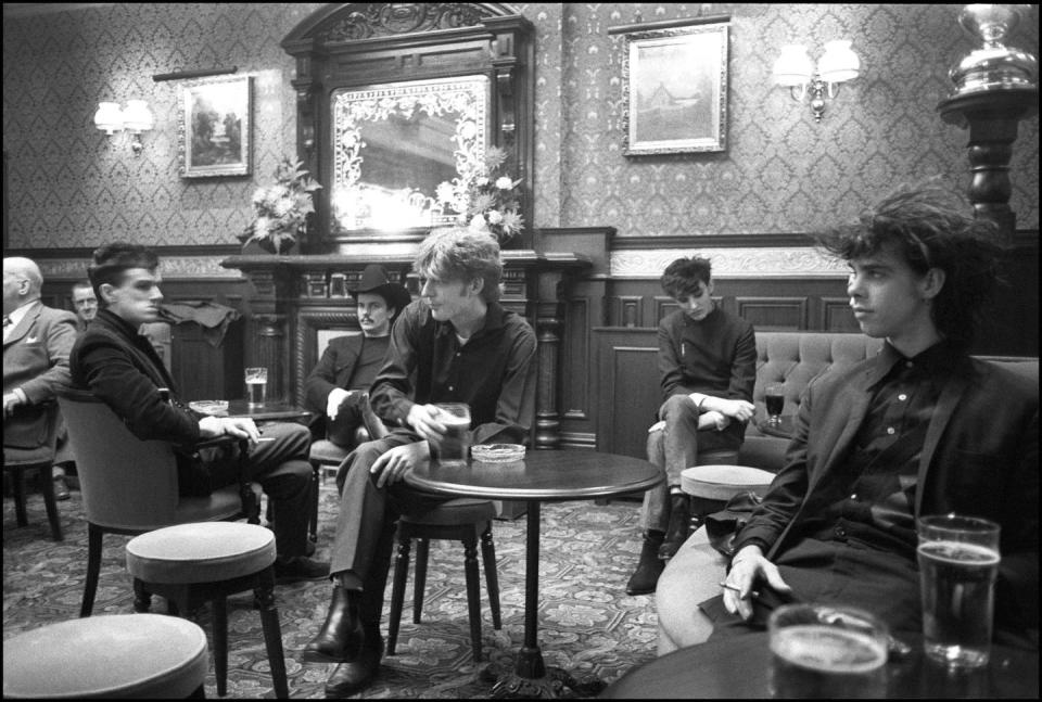 <p>Nick Cave and the Australian band The Birthday Party are getting in some downtime with beers at a cozy-looking pub somewhere in the Kilburn district in London. </p>