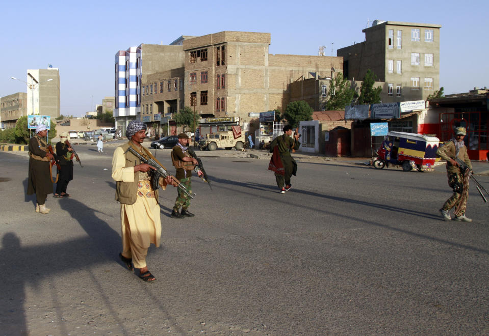 Private militia loyal to Ismail Khan, the former Mujahideen commander patrols after security forces took back control of parts of Herat city following fighting between Taliban and Afghan security forces in Herat province, west of Kabul, Afghanistan, Friday, Aug. 6, 2021. (AP Photo/Hamed Sarfarazi)