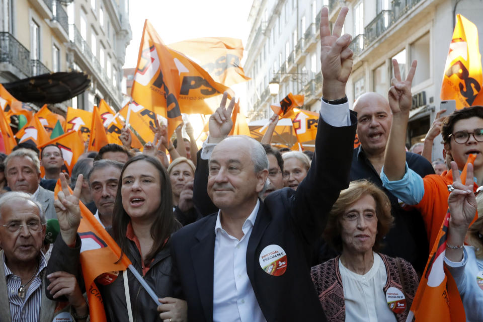 Rui Rio, leader of the Social Democratic Party, gestures during an election campaign action in downtown Lisbon Friday, Oct. 4, 2019. Portugal will hold a general election on Oct. 6 in which voters will choose members of the next Portuguese parliament. (AP Photo/Armando Franca)