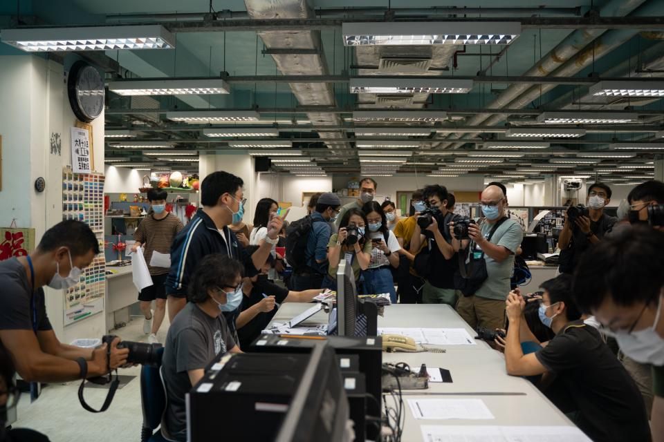 Newsroom of the Apple Daily newspaper, as security police raided the office (Getty Images)