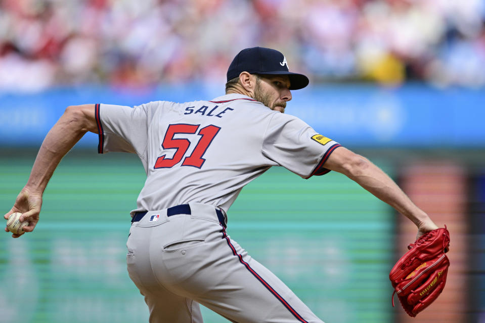 Atlanta Braves starting pitcher Chris Sale throws to a Philadelphia Phillies batter during the second inning of a baseball game Sunday, March 31, 2024, in Philadelphia. (AP Photo/Derik Hamilton)