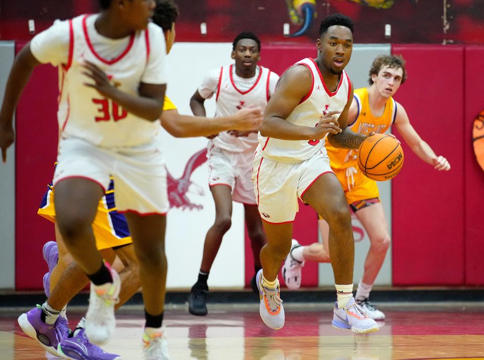 January 26, 2023; Glendale, Ariz; USA; Ironwood forward Julius Williams (0) dribbles up the court against Sunrise Mountain during a game at Ironwood High School.