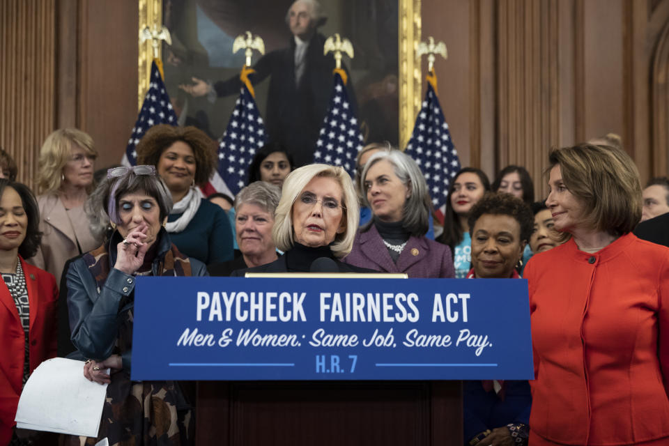 Lilly Ledbetter, center, an activist for workplace equality, is flanked by Speaker of the House Nancy Pelosi, D-Calif., right, and Rep. Rosa DeLauro, D-Conn., sponsor of the Paycheck Fairness Act, left, speaks at an event to advocate for the Paycheck Fairness Act on the 10th anniversary of President Barack Obama signing the Lilly Ledbetter Fair Pay Act, at the Capitol in Washington, Wednesday, Jan. 30, 2019. The legislation, a top tier issue for the new Democratic majority in the House, would strengthen the Equal Pay Act of 1963 and guarantee that women can challenge pay discrimination and hold employers accountable.(AP Photo/J. Scott Applewhite)