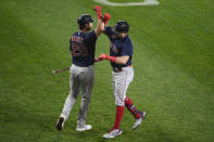 Boston Red Sox' Kyle Schwarber, right, celebrates his home run with Bobby Dalbec (29) during the second inning of a baseball game against the Baltimore Orioles, Tuesday, Sept. 28, 2021, in Baltimore. (AP Photo/Nick Wass)