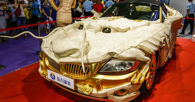 A BMW decorated with Yak bone carving and pure gold during an exhibition in China. Source: Getty