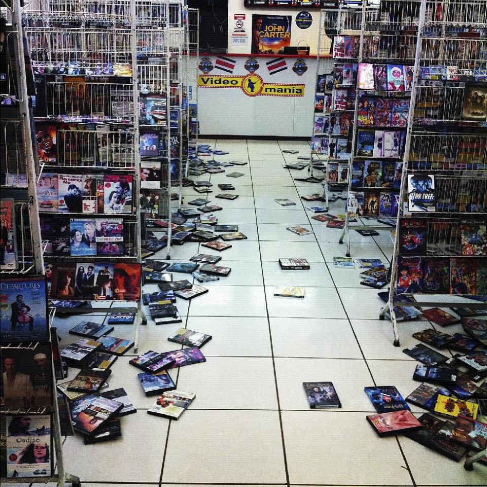 This photo posted to an Instagram account belonging to a person identified as Callie McCoy, shows videos strewn on the floor of a video store at the Paseo de las Flores mall in San Jose, Costa Rica, after an earthquake struck Wednesday, Sept. 5, 2012. A powerful, magnitude-7.6 earthquake shook Costa Rica and a wide swath of Central America on Wednesday. (AP Photo/Callie McCoy via Instagram)