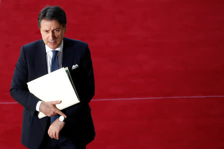 FILE PHOTO: Italian Prime Minister Giuseppe Conte arrives at an extraordinary European Union leaders summit to discuss Brexit, in Brussels, Belgium April 10, 2019. REUTERS/Susana Vera