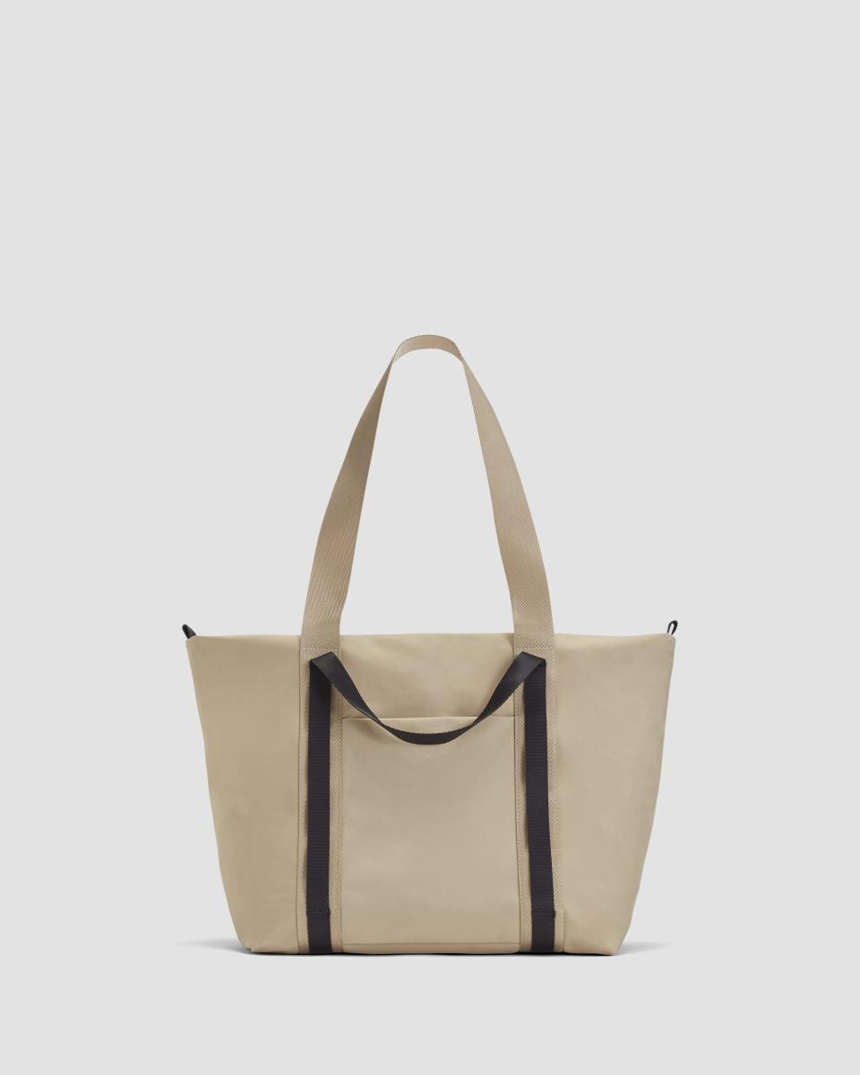 <p><a href="https://go.redirectingat.com?id=74968X1596630&url=https%3A%2F%2Fwww.everlane.com%2Fproducts%2Fwomens-recycled-nylon-tote-khaki&sref=https%3A%2F%2Fwww.harpersbazaar.com%2Ffashion%2Ftrends%2Fg46286806%2Fbest-tote-bags-with-zipper%2F" rel="nofollow noopener" target="_blank" data-ylk="slk:Shop Now;elm:context_link;itc:0;sec:content-canvas" class="link ">Shop Now</a></p><p>The Recycled Nylon Tote</p><p>everlane.com</p><p>$85.00</p><span class="copyright">Everlane</span>