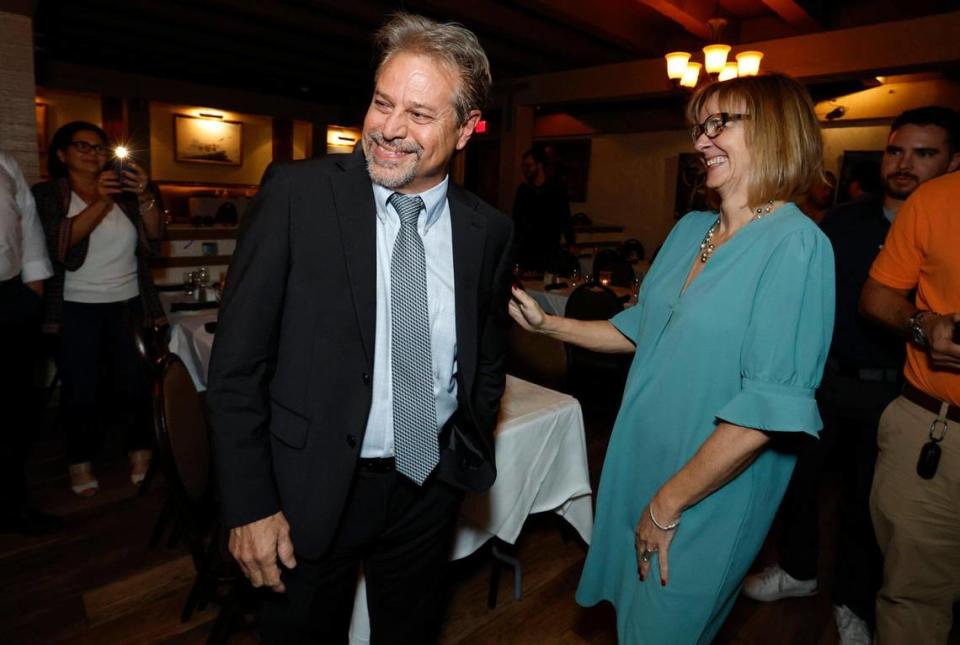 Candidate Miguel Gabela celebrates with Miami-Dade County Commissioner Eileen Higgins after results show him winning the District 1 seat on the Miami City Commission during his election night party at the 94th Aero Squadron Restaurant on Tuesday, Nov. 21, 2023.