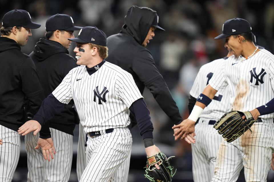 New York Yankees' Harrison Bader celebrates with teammates after a baseball game against the Cleveland Guardians Tuesday, May 2, 2023, in New York. The Yankees won 4-2. (AP Photo/Frank Franklin II)