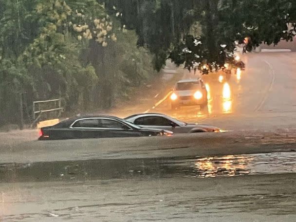 PHOTO: In this file photo taken on August 22, 2022 a handout photo provided by the Dallas Police Department shows vehicles sitting in flood waters along a street in Dallas, Texas. (Dallas Police Department/AFP via Getty Images, FILE)