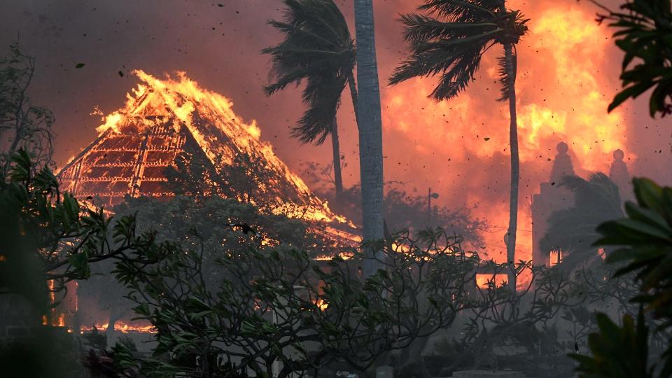 The hall of historic Waiola Church in Lahaina and nearby Lahaina Hongwanji Mission are engulfed in flames along Wainee Street on Tuesday, Aug. 8, 2023, in Lahaina, Hawaii.