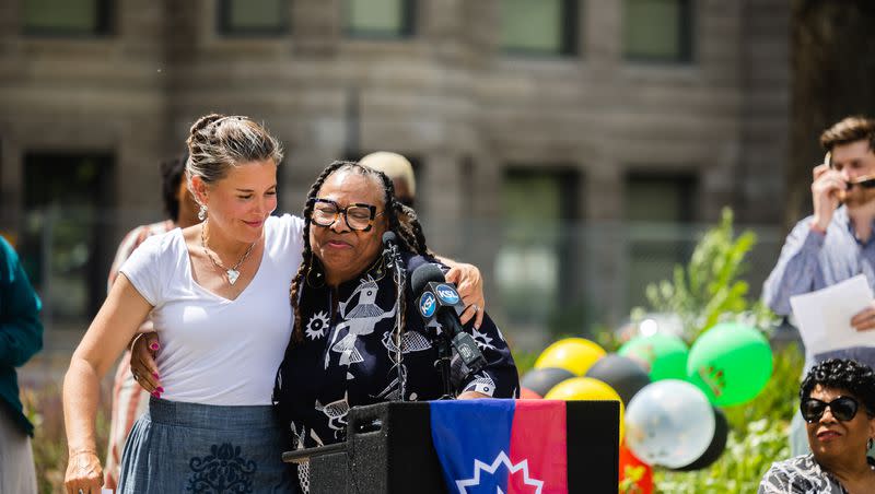 Betty Sawyer, executive director of the Project Success Coalition and Utah Juneteenth Freedom & Heritage Festival, hugs Salt Lake City Mayor Erin Mendenhall during the flag-raising ceremony for Juneteenth at the Salt Lake City and County Building in Salt Lake City on June 19, 2023.
