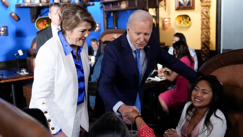 President Joe Biden and Maritza Rodriguez, Biden for President Latina adviser, greets patrons at Linda Michoacan Mexican Restaurant, during a stop in Las Vegas, Wednesday, July 17, 2024.