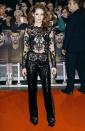 Two days later, Kristen was back in the spotlight (and back in Zuhair Murad!) at the European premiere of her soon-to-be blockbuster. Call us crazy, but we think this sequined jumpsuit is one of the coolest -- if not the coolest -- looks we've seen hit the red carpet in quite some time. (11/14/2012)