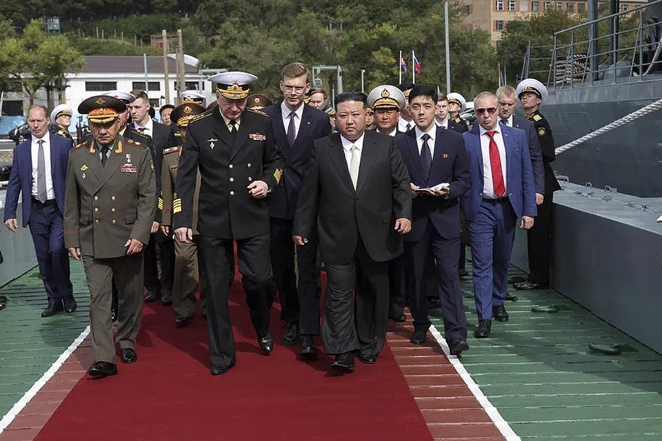 In this photo released by Russian Defense Ministry Press Service, North Korea's leader Kim Jong Un, center right, Russian Defense Minister Sergei Shoigu, left, and Admiral Nikolai Yevmenov, Commander-in-Chief of the Russian Navy, center left, visit the Admiral Shaposhnikov frigate of the Russian navy in the port of Vladivostok, Russian Far East Saturday, Sept. 16, 2023.(Russian Defense Ministry Press Service via AP)