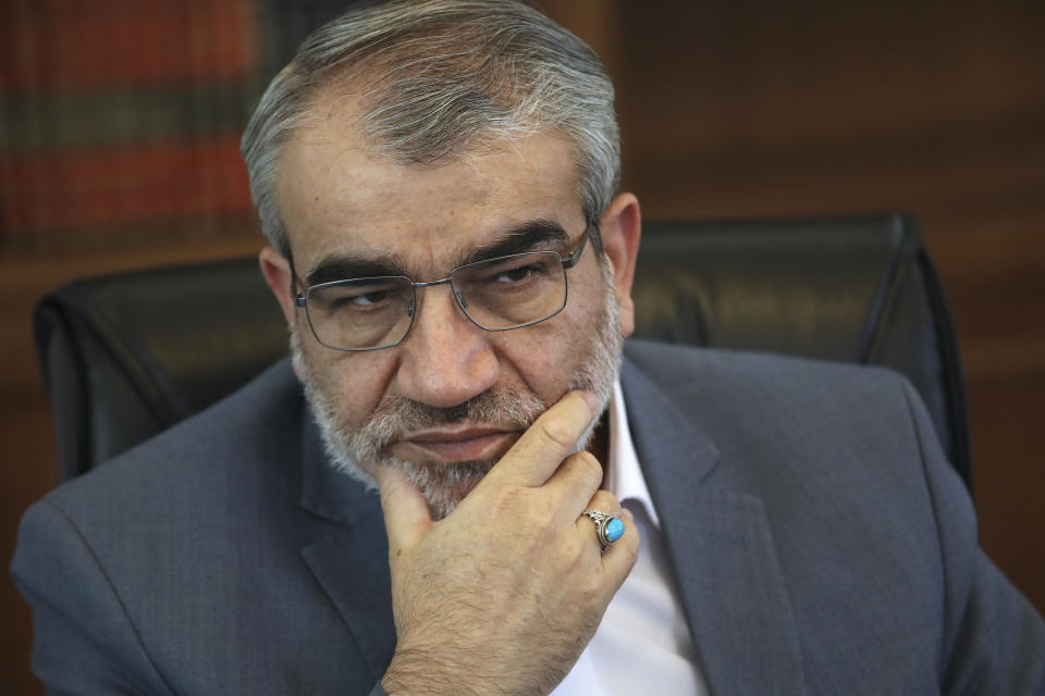 Spokesman of the Iranian Guardian Council Abbas Ali Kadkhodaei listens to a question in an interview with The Associated Press at his office in Tehran, Iran, Tuesday, May 18, 2021. (AP Photo/Vahid Salemi)