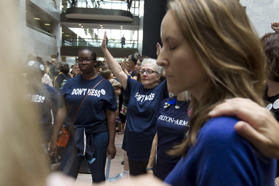 Protesters speak out as Kavanaugh hearing begins