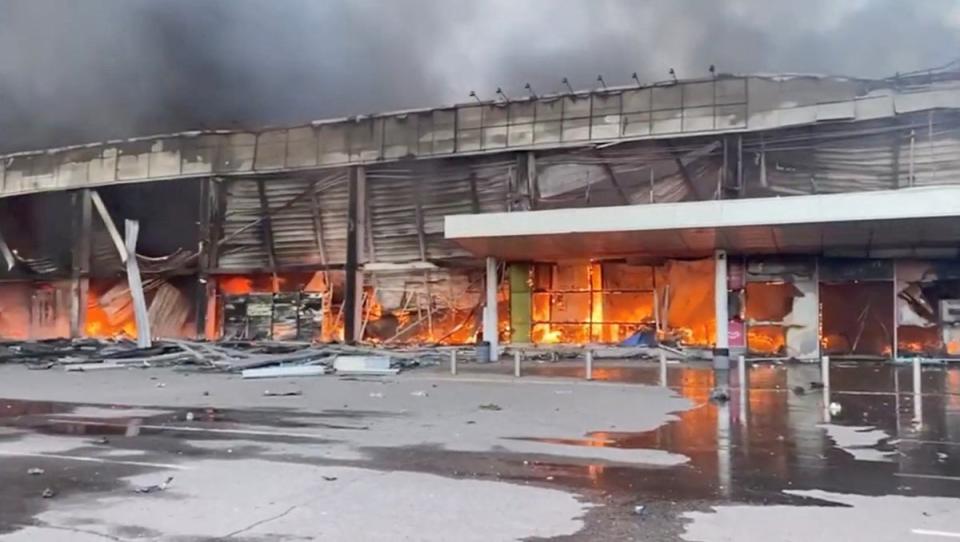 Footage of the moment a Russian missile hit a shopping centre in the Ukrainian city of Kremenchuk has been shared by the country’s president (Reuters)