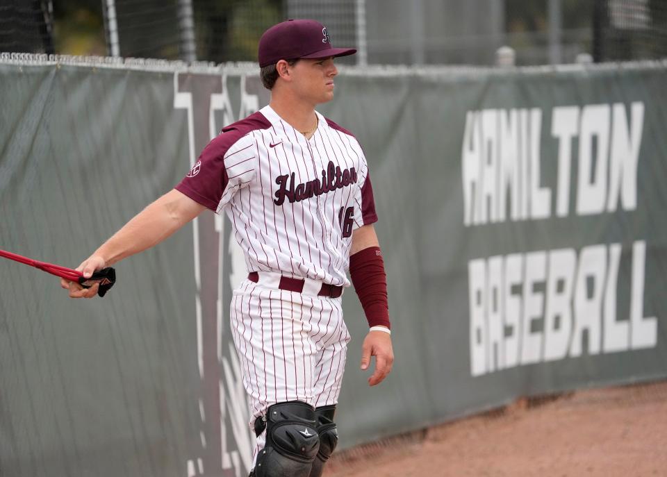 Hamilton catcher Drew Rogers prepares to play a game against Tolleson at Hamilton HS baseball field.