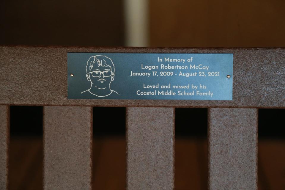 The bench has a plaque honoring the memory of Logan McCay.