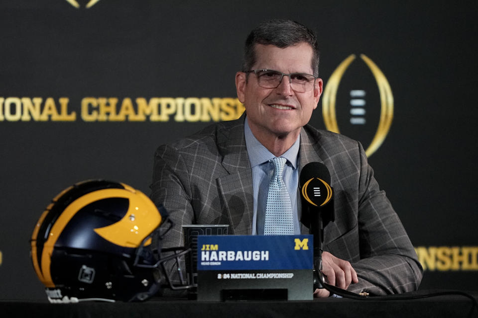 Michigan head coach Jim Harbaugh speaks during a news conference ahead of the national championship NCAA College Football Playoff game between Washington and Michigan Sunday, Jan. 7, 2024, in Houston. The game will be played Monday. (AP Photo/David J. Phillip)