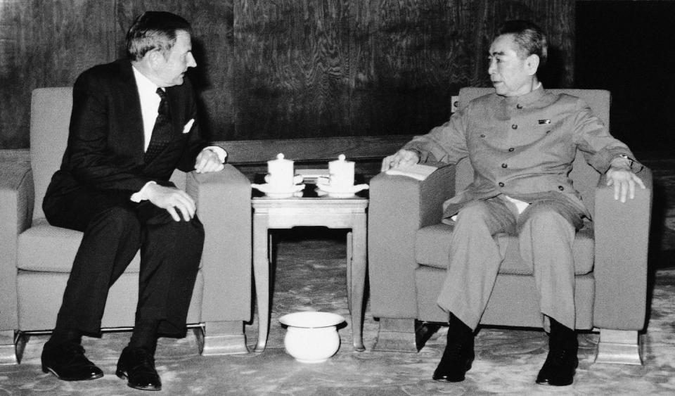 FILE - In this June 1973, file photo, David Rockefeller, left, meets with with Chinese Premier Chou En-lai in Peking. The billionaire philanthropist who was the last of his generation in the famously philanthropic Rockefeller family died Monday, March 20, 2017, according to a family spokesman. (AP Photo/File)